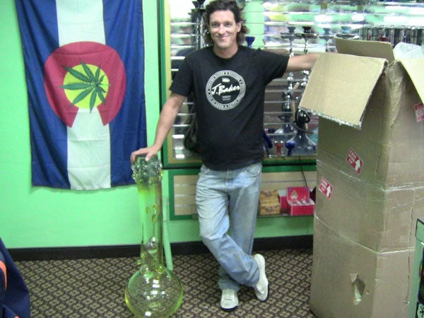 Jerome Baker stands next to Bongzilla at Myxed Up Denver in October 2014